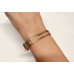 Bracelet manchette avec deux rangées de trous en plaqué Or (1 pièce)